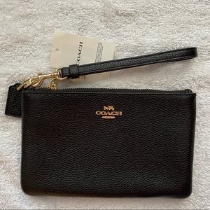 Coach black leather wristlet.  Never used